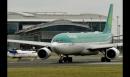 An Airbus A330-300 passenger aircraft, operated by Aer Lingus Group Plc, stands on the tarmac at Dublin Airport, operated by Dublin Airport Authority, in Dublin, Ireland, on Wednesday, Feb. 18, 2015.