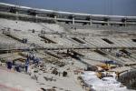 Labourers work on the renovations of the Maracana Stadium for the 2014 World Cup in Rio de Janeiro September 6, 2012. According to the consortium in charge, the construction of the stadium is 62% complete. 
