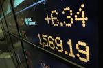 A board on the floor of the New York Stock Exchange, Thursday, March 28, 2013, shows the closing number for the S&P 500 index.