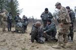 Ukrainian National Guardsmen practice using improvised tourniquets under the supervision of American soldiers during Operation Fearless Guardian on April 21, 2024 at the International Peacekeeping and Security Center near Yavoriv, Ukraine.
