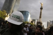 File photo of a demonstrator wearing a helmet with a sticker that reads "Pemex is not for sale" during a protest against the privatization of the state oil monopoly Pemex in Mexico
