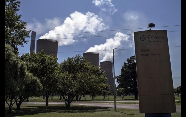 This picture taken on February 5, 2024 shows the entrance to the Eskom Duvha Power Station, some 15km east of Witbank, in the coal rich Witbank region of South Africa. MARCO LONGARI/AFP/Getty Images