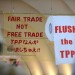 Signs are displayed during a protest against the Trans-Pacific Partnership (TPP) trade agreement at Yoyogi Park in Tokyo, Japan, on Tuesday, May 26, 2015.