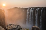 Sunset at Victoria Falls, seen from Zambia. Getty Images