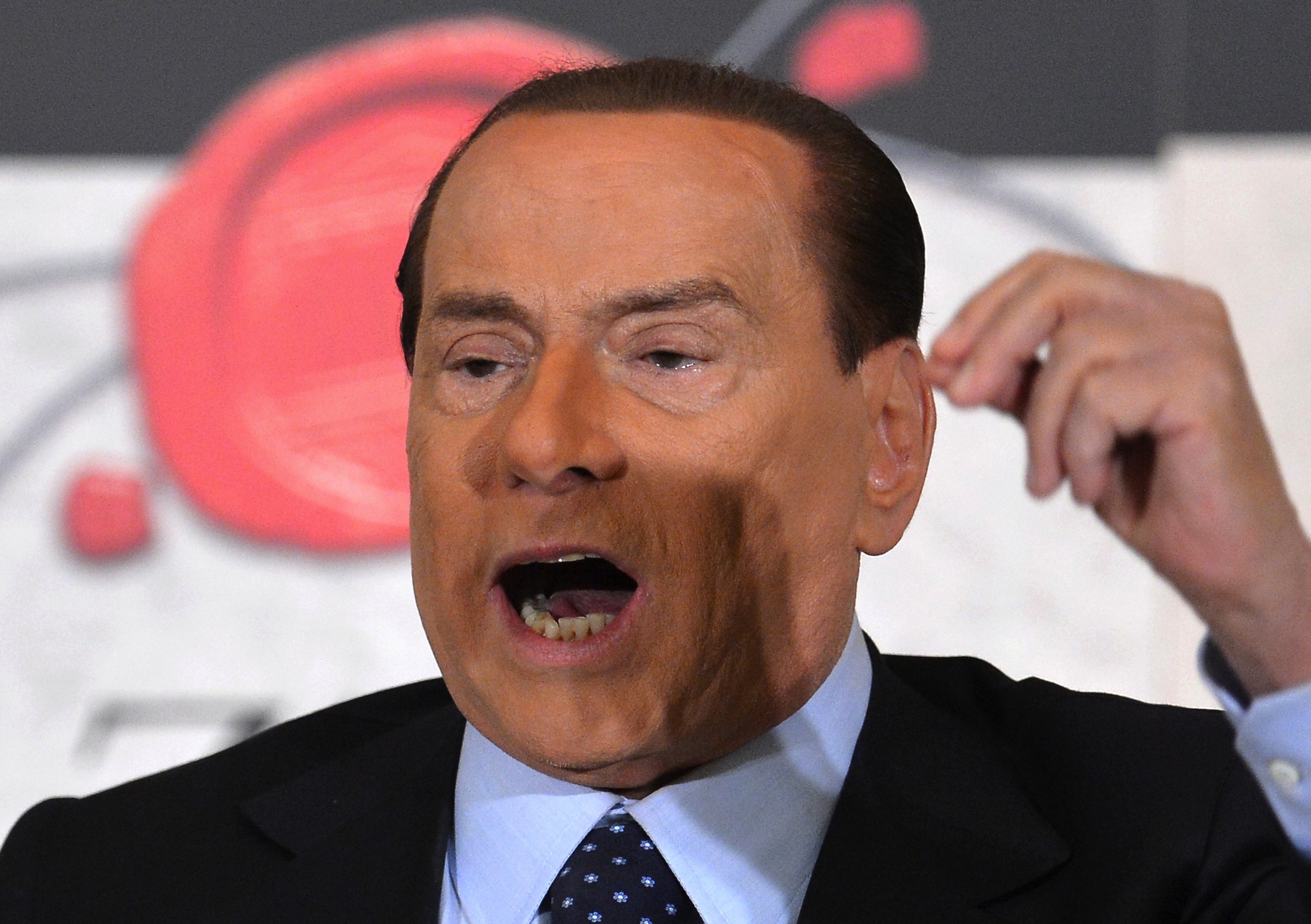 Silvio Berlusconi speaks during a press conference.