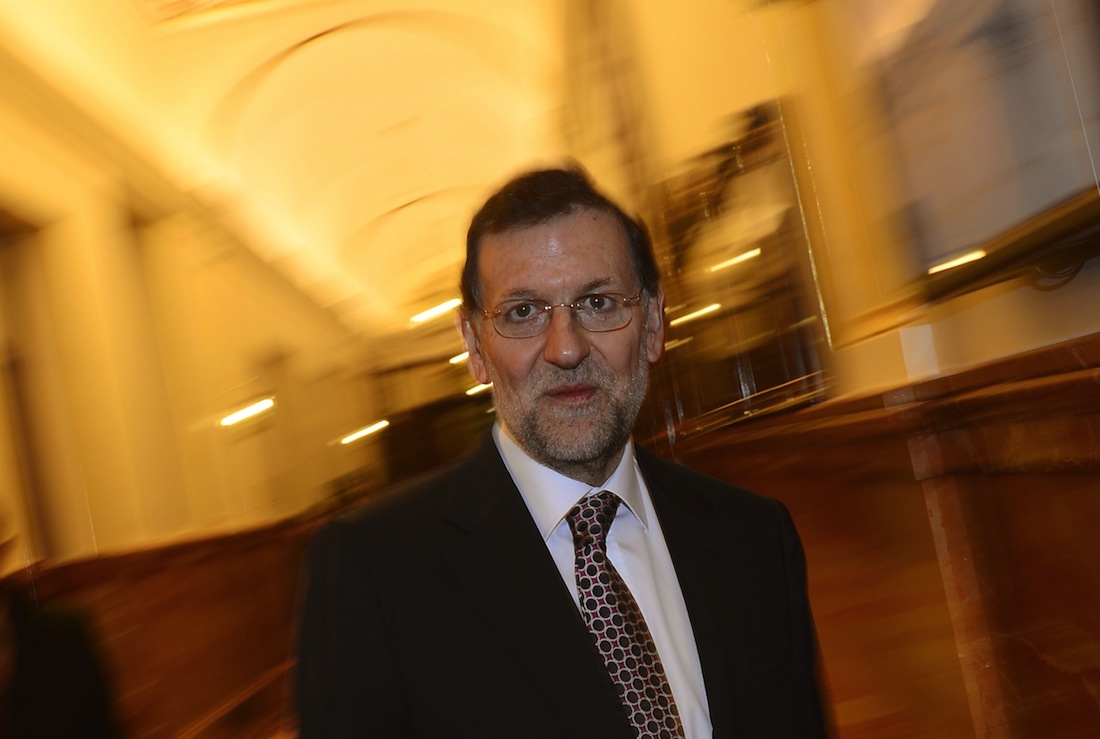 Spain's Prime Minister Mariano Rajoy arrives to attend a Parliament session in Madrid on December 19, 2012.