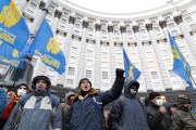 People gather in front of the Ukrainian cabinet of ministers building during a rally to support EU integration in Kiev December 4, 2013. REUTERS/Vasily FedosenkoPeople gather in front of the Ukrainian cabinet of ministers building during a rally to support EU integration in Kiev December 4, 2013. REUTERS/Vasily Fedosenko