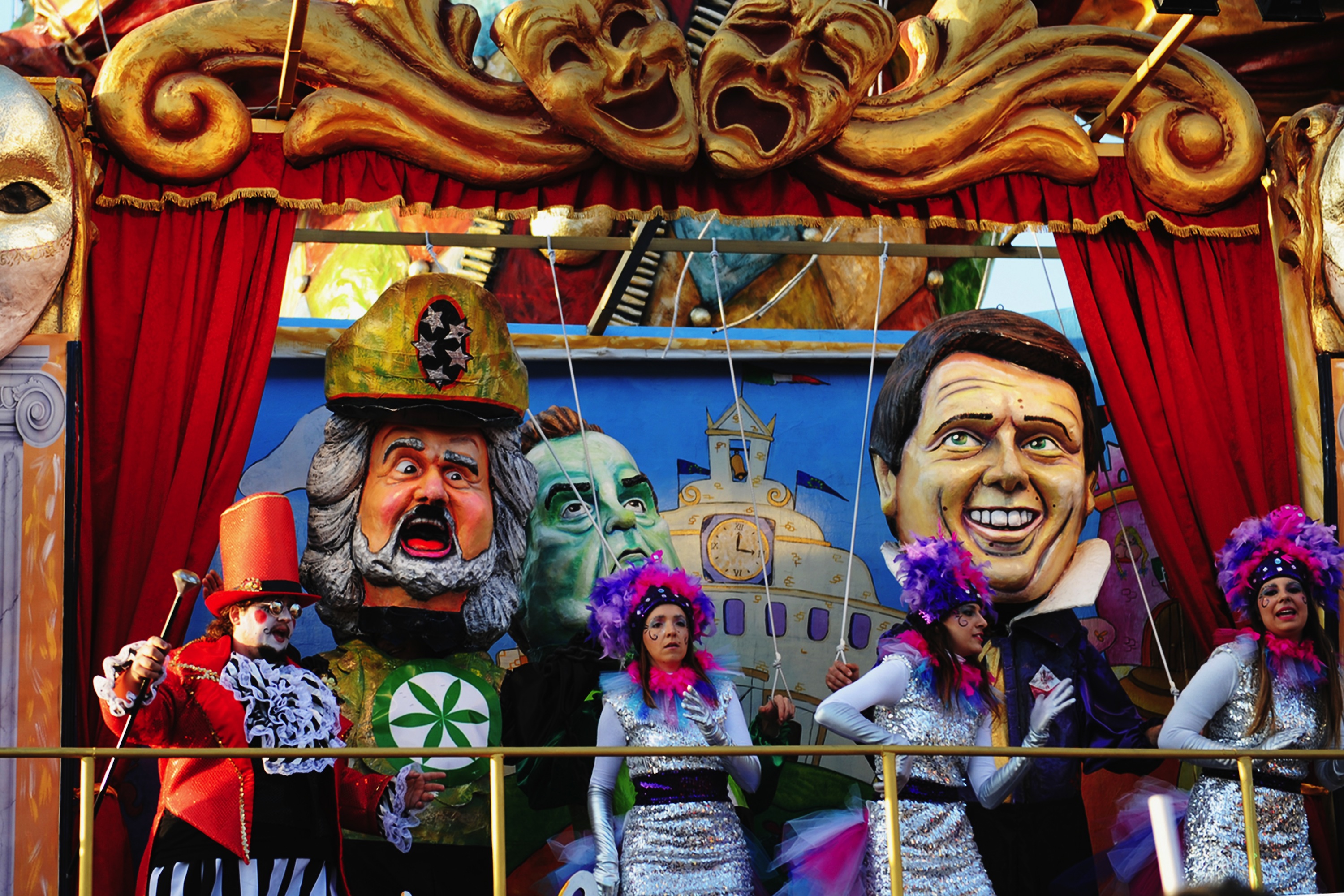 A giant papier-mache float representing Italian Prime Minister Matteo Renzi (R) and comedian politician beppe Grillo (L) moves through the streets of Viareggio during the traditional Carnival parade on March 9, 2024 in Viareggio, Italy. (Laura Lezza/Getty Images)