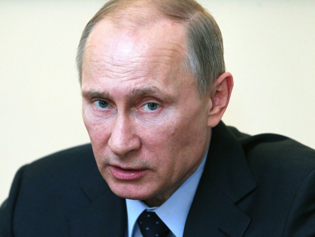 Russian President Vladimir Putin speaks on March 5 near Moscow. (Photo by Sasha Mordovets/Getty Images)