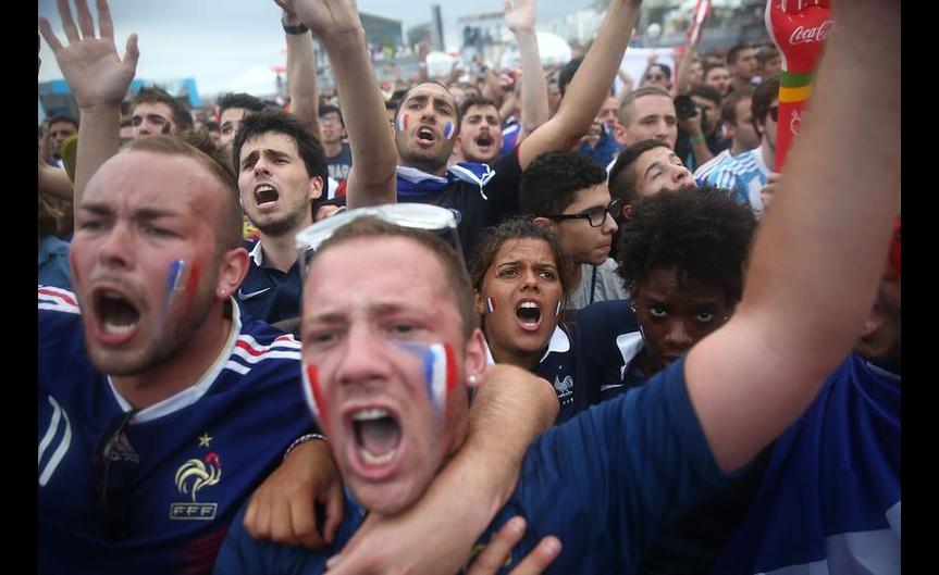 France fans celebrate after their 2014 FIFA World Cup match against Nigeria while watching at FIFA Fan Fest on Copacabana Beach on June 30, 2024 in Rio de Janeiro, Brazil.