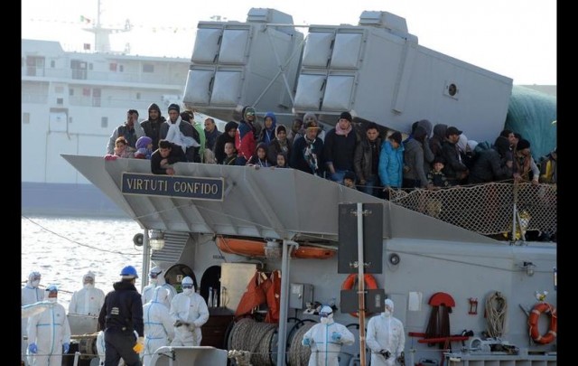 A boat transporting migrants arrives in the port of Messina after a rescue operation at see on April 18, 2024 in Sicily. GIOVANNI ISOLINO/AFP/Getty Images