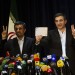 Iranian President Mahmoud Ahmadinejad (R) and Esfandyar Rahim Mashaie (L) flash the sign of victory during their press conference after Mashaie registered his candidacy for the upcoming presidential election at the interior ministry in Tehran on May 11, 2013. AFP PHOTO/BEHROUZ MEHRI