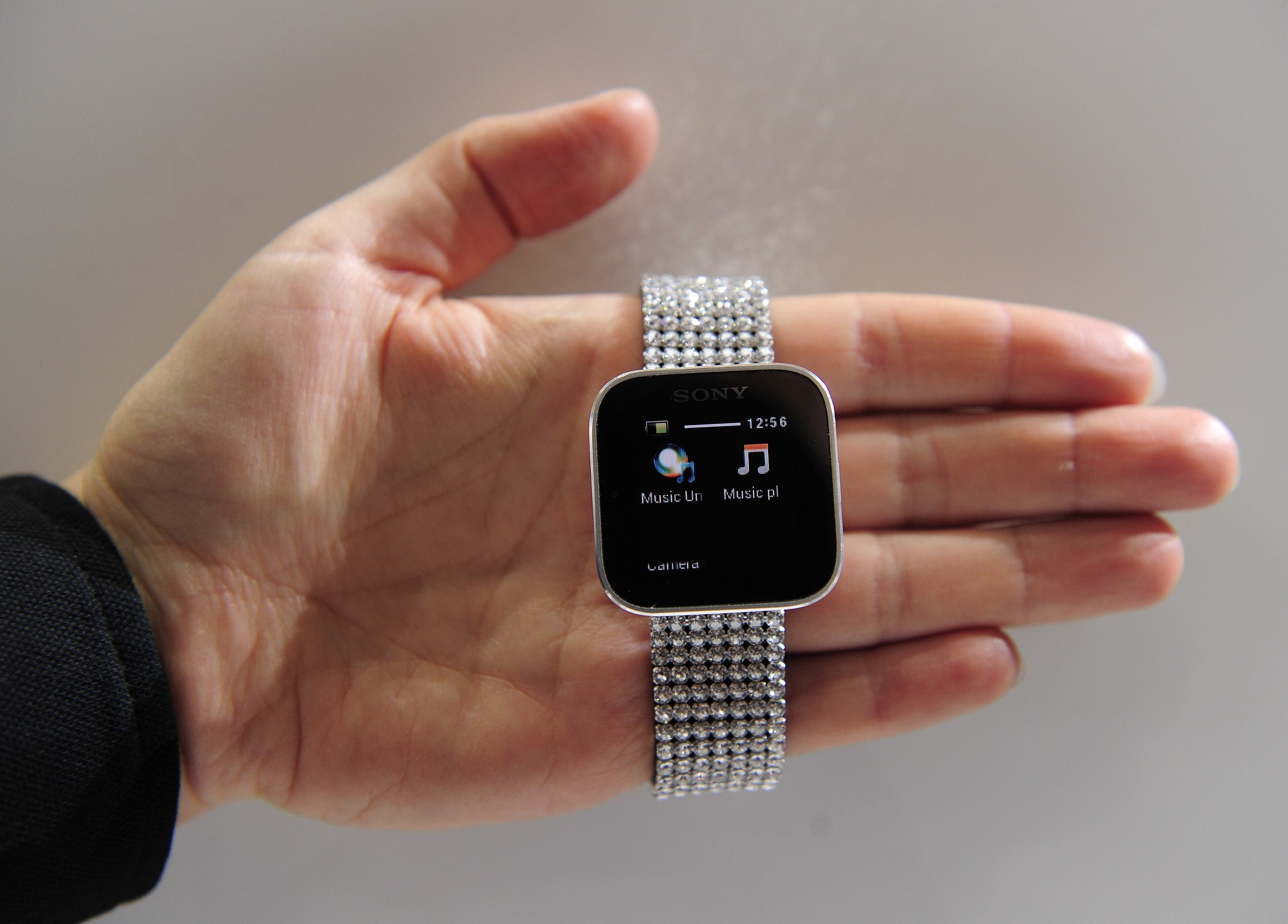 A hostess shows a Smartwatch by Sony on February 27, 2024 at the Mobile World Congress, the world's biggest mobile fair, in Barcelona.