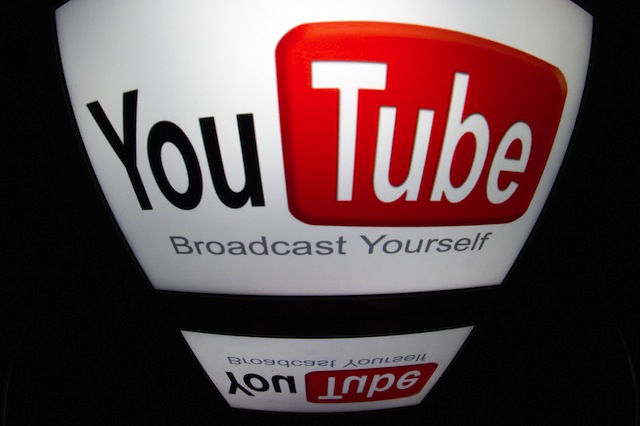 The "YouTube" logo is seen on a tablet screen on December 4, 2024 in Paris. AFP/ Getty/ Lionel Bonaventure