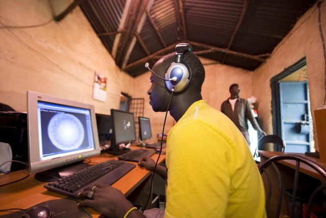 Young men surf the internet at a cyber cafe on June 20, 2024 in Kibera slum in  Nairobi. The Kenya government, in a bid to reduce computers software piracy, has moved to abolish tax on genuine software imports in its proposed 2012/2013 budget speech read in parliament last week by Kenya?s finance minister, Njeru Gitahe. The exorbitant prices on genuine software saw over 83 percent of software deployed on personal computers pirated during last year  when the commercial value of unlicensed or pirated software on computers in Eastern and Southern Africa, excluding South Africa, stands at US$108 million. The 83 percent piracy level in this region is almost double the global piracy rate for PC software, which is 42 per cent according to the Business Software Alliance (BSA) 2011 Global Software Piracy Study findings, which evaluates the state of software piracy around the world. AFP PHOTO/Tony KARUMBA        (Photo credit should read TONY KARUMBA/AFP/GettyImages)