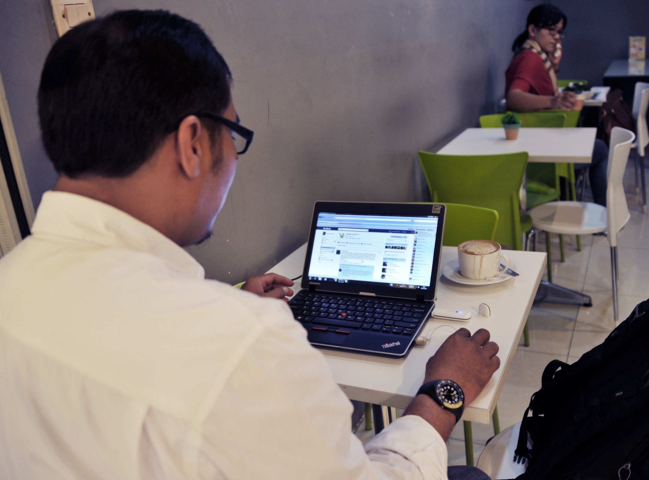 A man opens Facebook on his laptop at a coffee shop in Jakarta. AFP/ Getty/ Bay Ismoya
