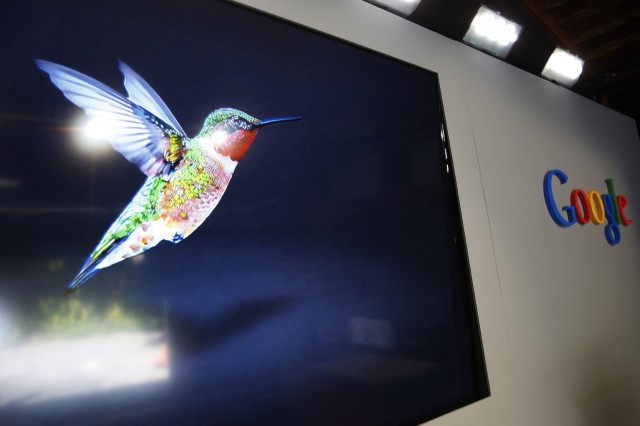 A logo of Google's 'Hummingbird' search algorithm is pictured at the garage where the company was founded on Google's 15th anniversary in Menlo Park, California September 26, 2013. Google Inc has overhauled its search algorithm, the foundation of the Internet's dominant search engine, to better cope with the longer, more complex queries it has been getting from Web users. Amit Singhal, senior vice president of search, told reporters on Thursday that the company launched its latest "Hummingbird" algorithm about a month ago and that it currently affects 90 percent of worldwide searches via Google REUTERS/Stephen Lam (UNITED STATES - Tags: SCIENCE TECHNOLOGY BUSINESS ANNIVERSARY LOGO)