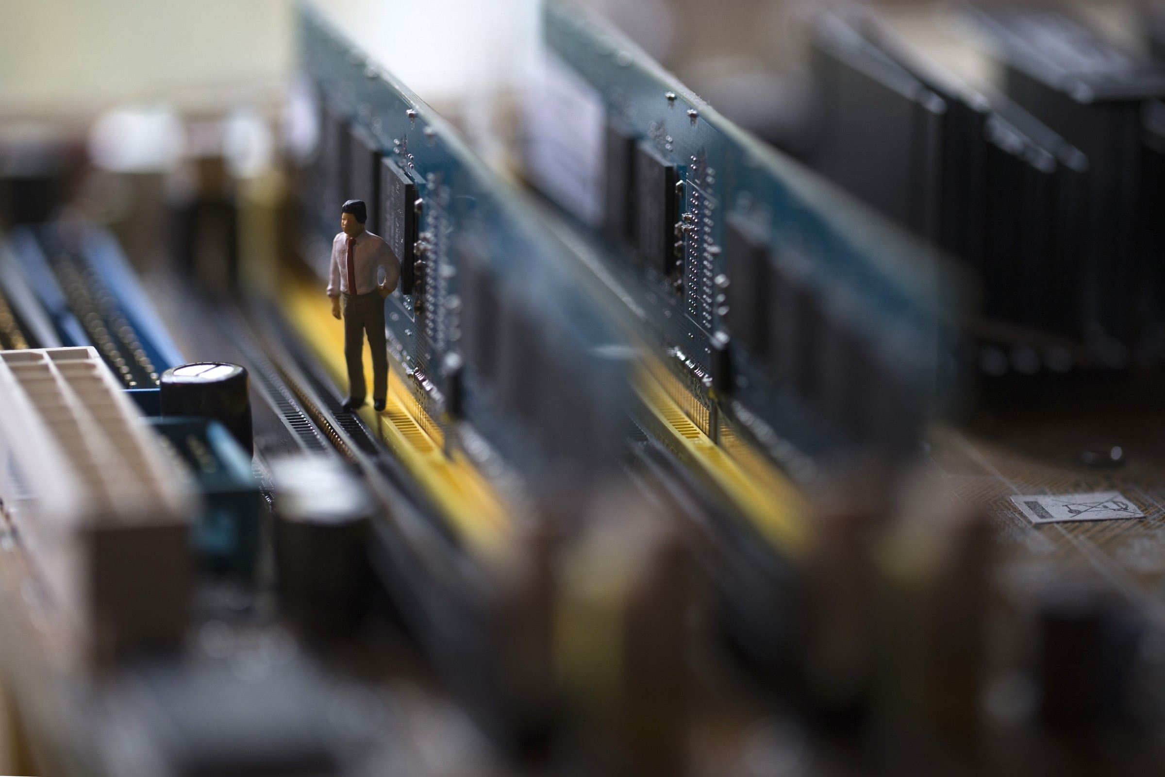 A figuring near memory chips for a computer. Getty Images/Joel Saget.