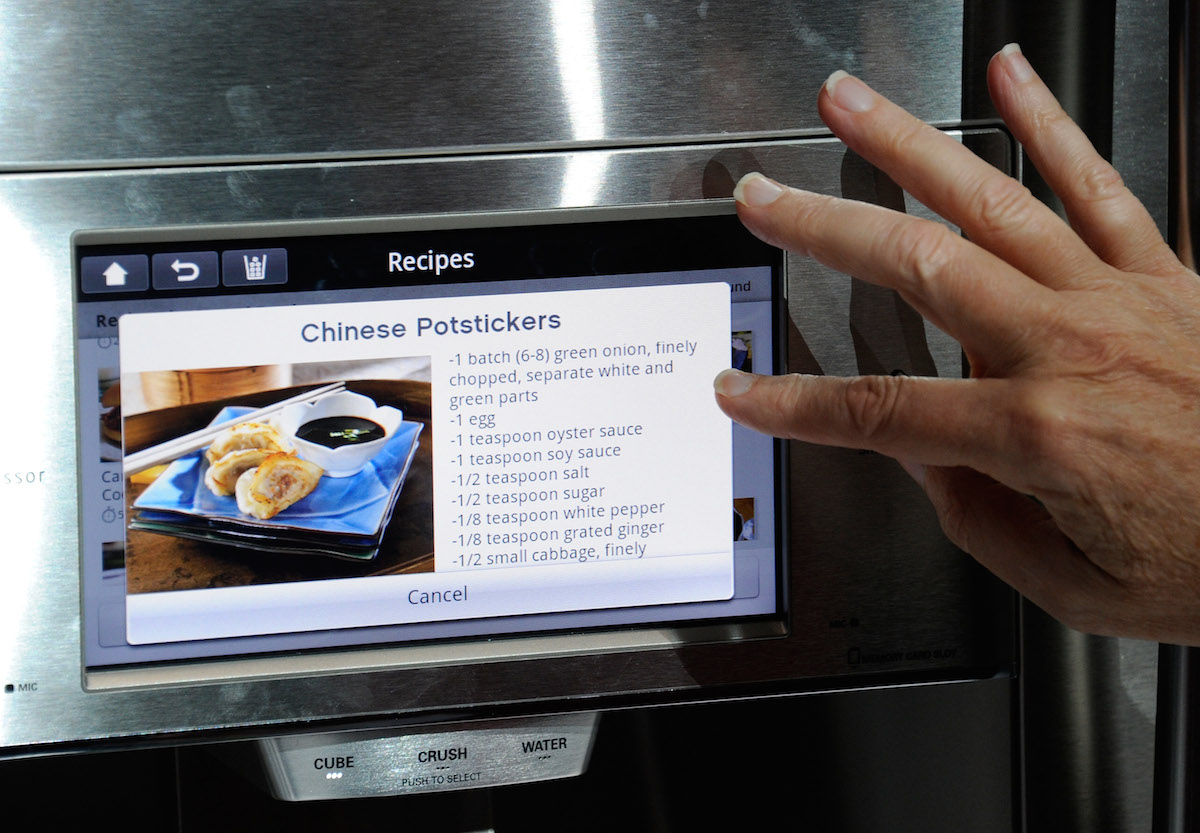 A user operates an interface on a refrigerator using LG's Smart ThinQ technology. Ethan Miller/Getty Images