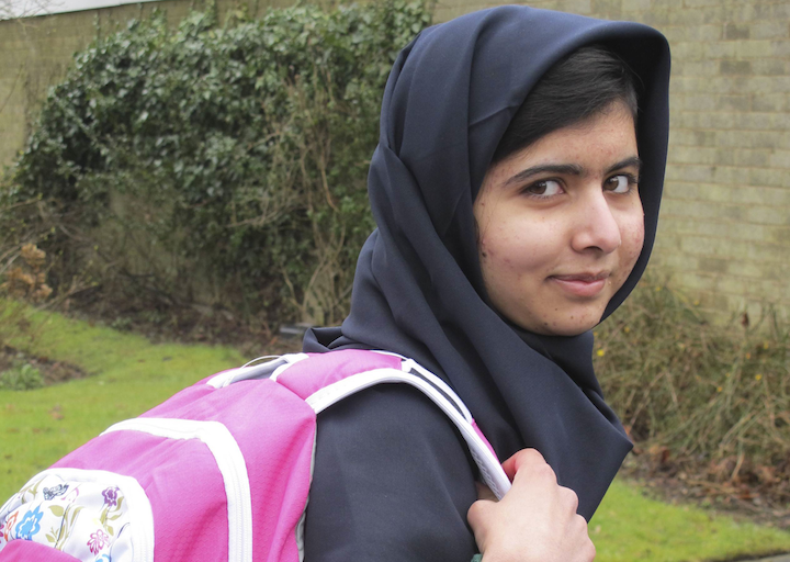Malala Yousufzai smiles as she attends Edgbaston High School for girls in Edgbaston, central England in this handout photograph released March 19, 2013.