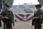 French soldiers of the BOALI operation in Central African Republic stand guard at a checkpoint near Bangui Airport on October 10, 2024