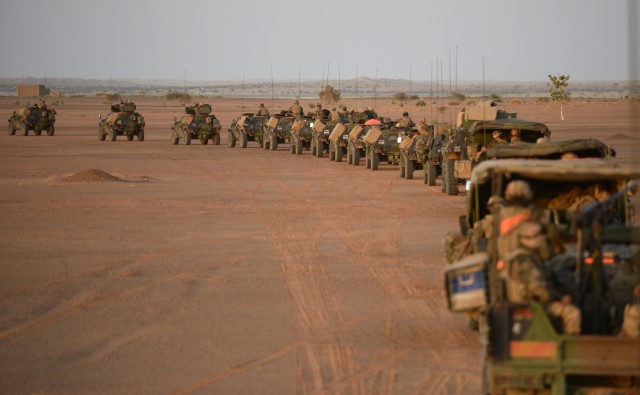 A French army convoy leaves camp at sunrise on November 2, 2013, during Operation Hydra near Gao in northern Mali.
