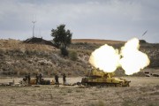 An Israeli artillery seen fire on the morning July 18, 2024 near Israeli Gaza border. (Ilia Yefimovich/Getty Images)
