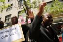 Men pray for the safe return of the 276 abducted schoolgirls outside the Permanent Mission of Nigeria to the United Nations on June 2, 2024 in New York City.