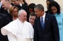 Pope Francis talks with President Barack Obama after arriving at Andrews Air Force Base in Md., Tuesday, Sept. 22, 2015.