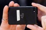 Andrew Bocking, senior vice president, Software Product Management at Research In Motion, takes a picture with his Blackberry Li