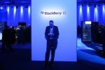 A Journalist stands beneath the BlackBerry 10 mobile platform sign after it was unveiled January 30, 2024 at the New York City L