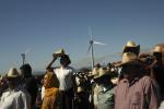In this Jan. 22, 2009, file photo, people watch during the inauguration of a new $550 million wind farm project in La Ventosa, Mexico, located on the narrow isthmus between the Gulf of Mexico and the Pacific Ocean. 