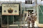 In this June 27, 2024 file photo, reviewed by a U.S. Department of Defense official, U.S. military guards walk within Camp Delta military-run prison, at the Guantanamo Bay U.S. Naval Base, Cuba. 