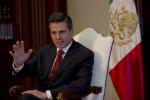 Enrique Pena Nieto speaks during an interview with The Associated Press at the Los Pinos presidential residence in Mexico City, Monday, Dec. 10, 2012. 
