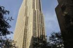 A New York City Fire Department ambulance passes by the General Electric Building at Rockefeller Plaza, where NBC's headquarters