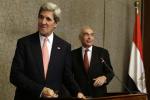 U.S. Secretary of State John Kerry, left, and Egyptian Foreign Minister Mohammed Kamel Amr leave after a news conference at the Ministry of Foreign Affairs in Cairo, Egypt on Saturday, March 2, 2013.