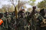 South Sudanese soldiers withdraw from the garrison town of Jau, at the disputed border with Sudan March 17, 2013.