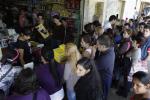 In this June 1, 2024 photo, Paraguayan shoppers buy products in a shop in the town of Clorinda, Argentina, just across the border from Paraguay.