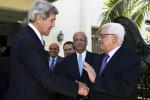US Secretary of State John Kerry (L) bids farewell to Palestinian president Mahmud Abbas after their second meeting in the Jordanian capital Amman on June 29, 2013. 