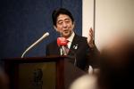 Japanese Prime Minister Shinzo Abe speaks during the 'Bahrain - Japan Business Meetings' in the Bahraini capital Manama, on August 25, 2013. 