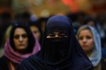 Afghan women attend a political gathering in a wedding hall in Kabul on September 3, 2013. 