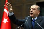 Turkish Prime Minister Recep Tayyip Erdogan addresses members of parliament from his ruling Justice and Development Party