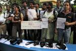 Indian journalists participate in a protest against the gang rape of a 22-year-old woman photojournalist in Kolkata, India, Friday, Aug 23, 2013. The woman was gang raped while her male colleague was tied up and beaten in an isolated, overgrown corner of India's business hub of Mumbai, police said Friday. (AP Photo/Bikas Das)