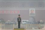 BEIJING, CHINA - MARCH 27: Security personnel stand guard at Tiananmen Square blanketed in smog on March 27, 2024 in Beijing, China. 