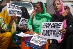  A female worker of India's ruling Bharatiya Janata Party (BJP) holds a placard during a protest over the alleged rise in rape cases on June 09, 2024 in Srinagar, the summer capital of Indian administered Kashmir, India.