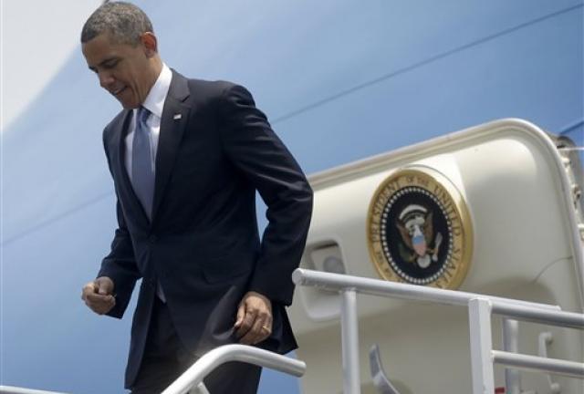 President Barack Obama leaves Air Force One upon his arrival at Benito Juarez International Airport in Mexico City, Thursday, May 2, 2013. Obama is traveling on a three-day trip to Mexico an Costa Rica. 