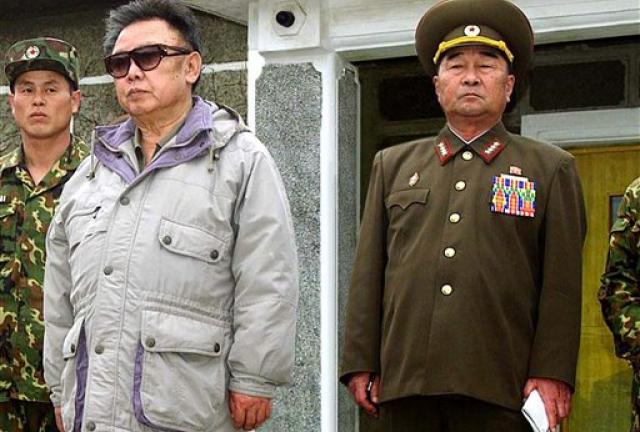 FILE - In this April 23, 2007 file photo released by Korean Central News Agency via Korea News Service in Tokyo, Gen. Kim Kyok Sik, right, stands with then-North Korean leader Kim Jong Il during the leader's inspection of Korean People's Army Unit 1637 at an undisclosed location in North Korea. FILE - In this April 23, 2007 file photo released by Korean Central News Agency via Korea News Service in Tokyo, Gen. Kim Kyok Sik, right, stands with then-North Korean leader Kim Jong Il during the leader's inspection of Korean People's Army Unit 1637 at an undisclosed location in North Korea.