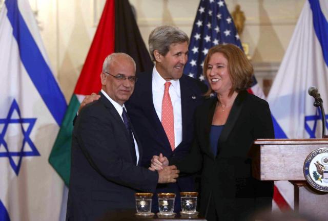 Secretary of State John Kerry stands with Israel's Justice Minister and chief negotiator Tzipi Livni, right, and Palestinian chief negotiator Saeb Erekat, after the resumption of Israeli-Palestinian peace talks, Tuesday, July 30, 2013, at the State Department in Washington. Secretary of State John Kerry stands with Israel's Justice Minister and chief negotiator Tzipi Livni, right, and Palestinian chief negotiator Saeb Erekat, after the resumption of Israeli-Palestinian peace talks, Tuesday, July 30, 2013, at the State Department in Washington.