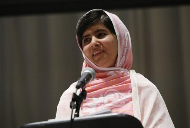 FILE - In this Friday, July 12, 2013 file photo provided by the United Nations Foundation, Malala Yousafzai celebrates her 16th birthday by addressing hundreds of young leaders who support the United Nation’s Secretary General's Global Education First Initiative, during 'Malala Day' at United Nations Headquarters. It appears the Pakistani schoolgirl who survived a Taliban assassination attempt can add Queen Elizabeth II to her list of admirers. Buckingham Palace officials said Sunday, Oct. 6, 2013, that Malala Yousafzai has been invited to an Oct. 18 reception that will be hosted by the queen and her husband, Prince Philip. Other guests will include academics and teachers. (AP Photos/United Nations Foundation, Stuart Ramson, File) FILE - In this Friday, July 12, 2013 file photo provided by the United Nations Foundation, Malala Yousafzai celebrates her 16th birthday by addressing hundreds of young leaders who support the United Nation’s Secretary General's Global Education First Initiative, during 'Malala Day' at United Nations Headquarters. It appears the Pakistani schoolgirl who survived a Taliban assassination attempt can add Queen Elizabeth II to her list of admirers. Buckingham Palace officials said Sunday, Oct. 6, 2013, that Mal