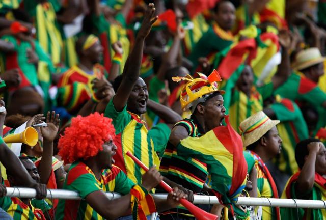 In this photo taken Monday, Jan. 21 2013, Ethiopian supporters celebrate a goal during a game against Zambia, during their African Cup of Nations tournament in Nelspruit, South Africa. After falling off the football map for thre decades Ethiopia is now just two games away from qualifying for the 2014 World Cup in Brazil. In this photo taken Monday, Jan. 21 2013, Ethiopian supporters celebrate a goal during a game against Zambia, during their African Cup of Nations tournament in Nelspruit, South Africa. After falling off the football map for thre decades Ethiopia is now just two games away from qualifying for the 2014 World Cup in Brazil.